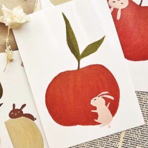 Breezy Studio – Red Apple Rabbit Hug – Postcard