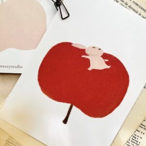 Breezy Studio – Red Apple Rabbit Tired – Postcard